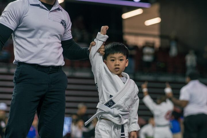 Young Labyrinth BJJ student in a white gi